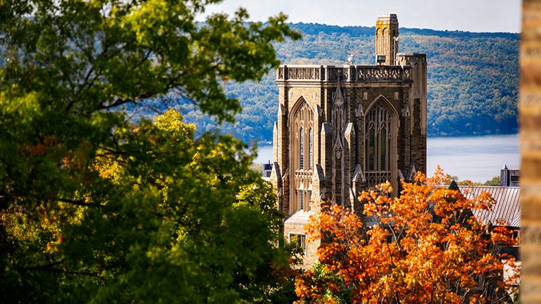 Afternoon light catches the War Memorial tower as fall colors start to appear on the trees.